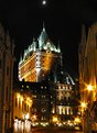 Picture Title - Moon passing over Chateau Frontenac.