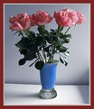 Picture Title - Orange roses in a Blue Vase