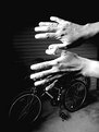 Picture Title - Hands and bicycle