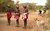 three samburu warriors posing for others