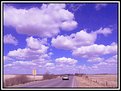 Picture Title - Clouds Along a Rural Road.