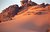 Sanddune covering rocks in Libyan desert