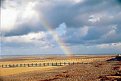Picture Title - Rhyl beach with rainbow
