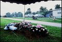 Picture Title - New Grave(from that day), WIRE FENCE,  Killer dogs (really) and antique autos.  07 2004.