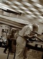Picture Title - Old man in library