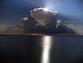 Picture Title - Moonrise over a Storm.