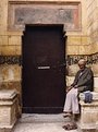 Picture Title - waiting on mosque door