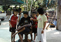 Picture Title - Artist (with audience) in a Thai Garden