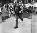 Picture Title - racist running away
