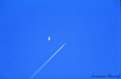 Picture Title - Moon & a plane