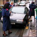 Picture Title - How many metermaids does it take to give a ticket?