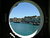 Procida island from a porthole