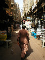 Picture Title - Man walks past an old street