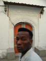 Picture Title - Black man orange door