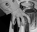 Picture Title - Three cans and one hand