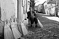 Picture Title - man and brooms