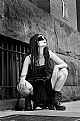 Picture Title - A girl wearing goggles in an alley