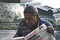 Picture Title - Reading the Paper