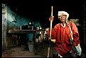 Picture Title - a wide angle view of the man at the tea stall