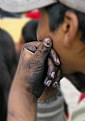 Picture Title - Hand of a Young Shoe Shiner