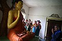 Picture Title - Devotee among statues