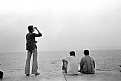 Picture Title - Young Men on Sea Bank