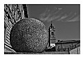 Picture Title - a Big stone-ball vs Bell tower