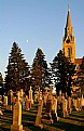 Picture Title - Dying embers on graveyard and steeple