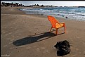 Picture Title - Solitary yellow plastic chair 