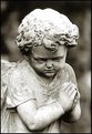 Picture Title - Cherub:quietly waiting over 100 years. June 2003