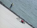 Picture Title - Fisherman with fallen bike.