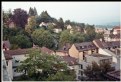 Picture Title - Houses and trees under clouds