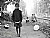 Standing Alone - family in the background