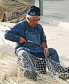 Picture Title - Repairing fishing net