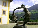 Picture Title - Statue with village in the background