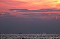 Picture Title - Fishing boat during sunrise