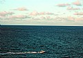Picture Title - Clouds, Boat & Ocean