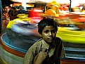 Picture Title - merry-go-round and boy in a fair