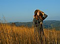Picture Title - Girl and a dry autumn grass