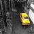 The yellow taxi in the rain 