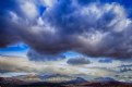 When clouds hang over red rock