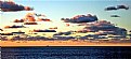 Picture Title - Clouds & Distant Ship