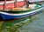 a coloured boat in burano