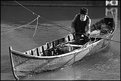 Picture Title - The fisherman between two ships